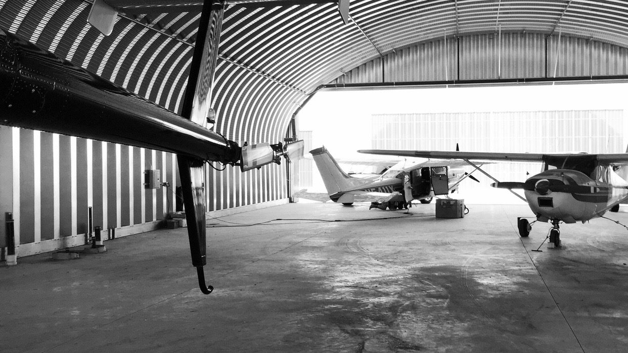 A piloted release aircraft in a hangar